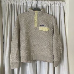 Patagonia pullover. Size medium. Grey with yellow trim. Lightly used.